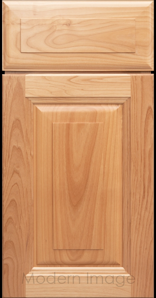 Durango raised panel cabinet door in a Natural stain featuring a stepped molded frame.